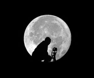 56964316 - a self portrait taking a photo of the supermoon